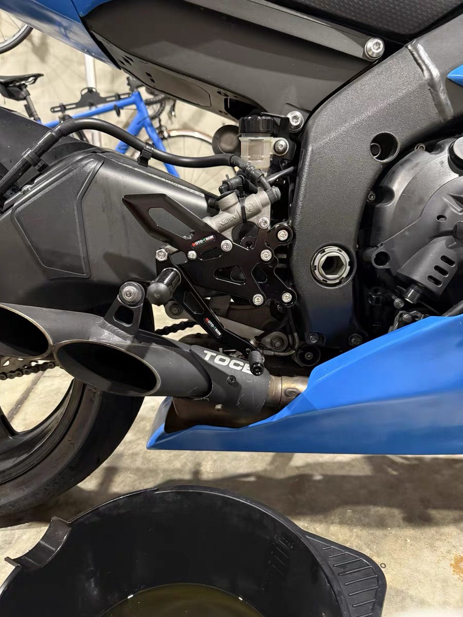 Repose-pieds arrière réglables - Motorcycle Gear Lever Extender avis et prix